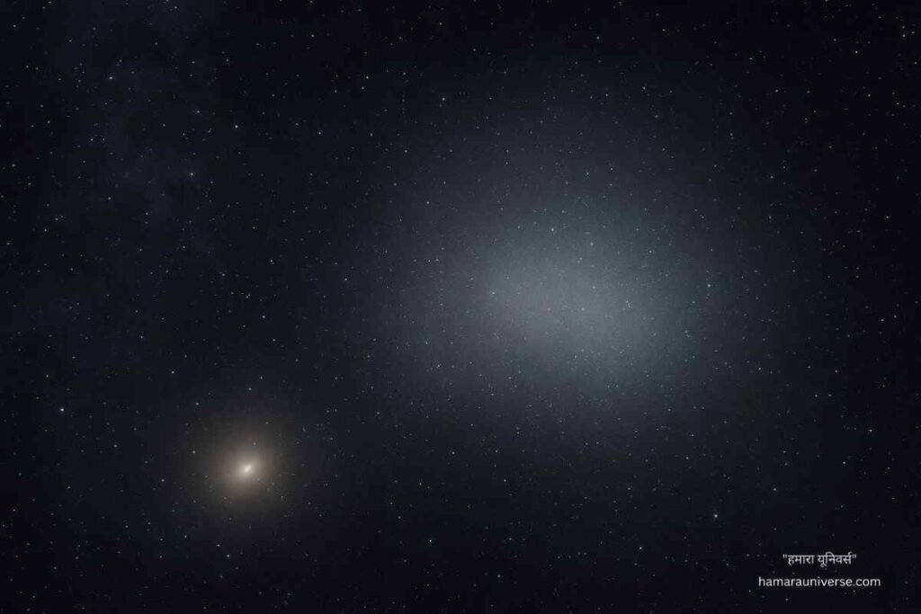 डार्क मैटर के बिना NGC 1052-DF2 (ultra-diffuse galaxy) का दृश्यात्मक चित्र, जिसमें तारे कम और संरचना धुंधली दिखाई देती है।